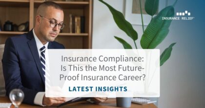 Insurance compliance officer reviewing regulatory documents and insurance policies